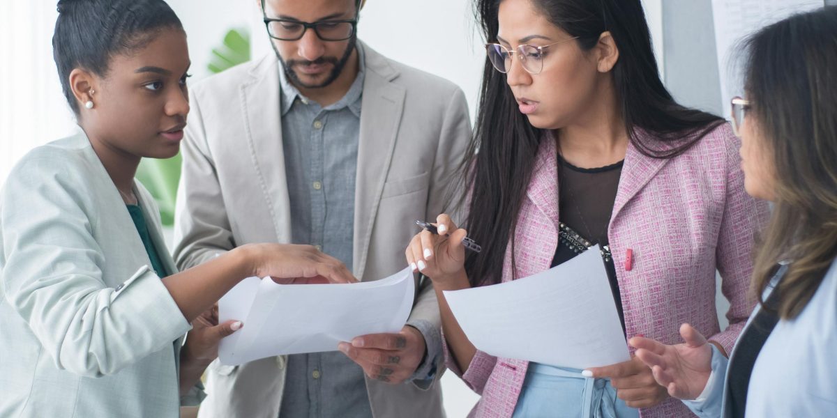 A team collaborating effectively, ensuring synchronized efforts on strategic data goals.