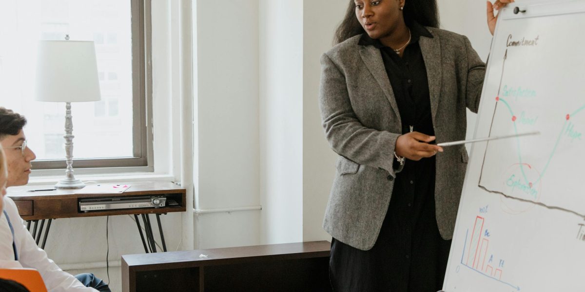A professional presenting insightful data findings to a team, demonstrating effective communication.