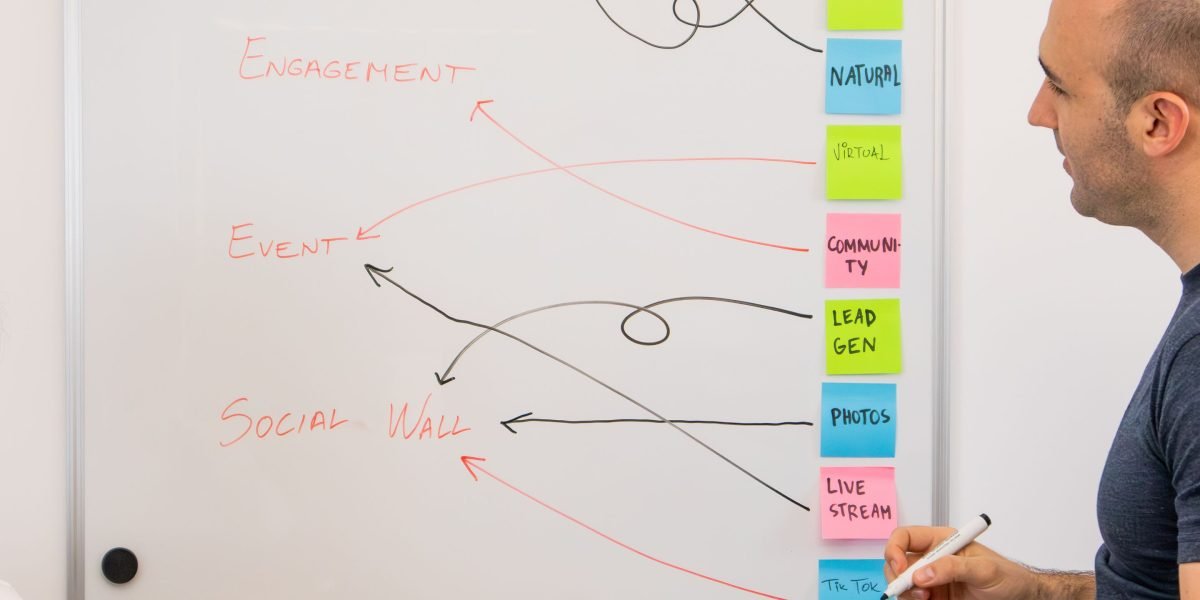 A professional engaging a team in a strategic discussion, symbolizing the meta data scientist's role in designing systems rather than just operating tools.
