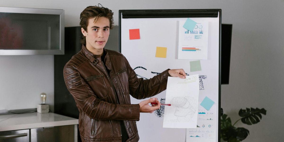 A person confidently presenting their project portfolio, emphasizing the importance of practical work and meta skills over mere certifications.