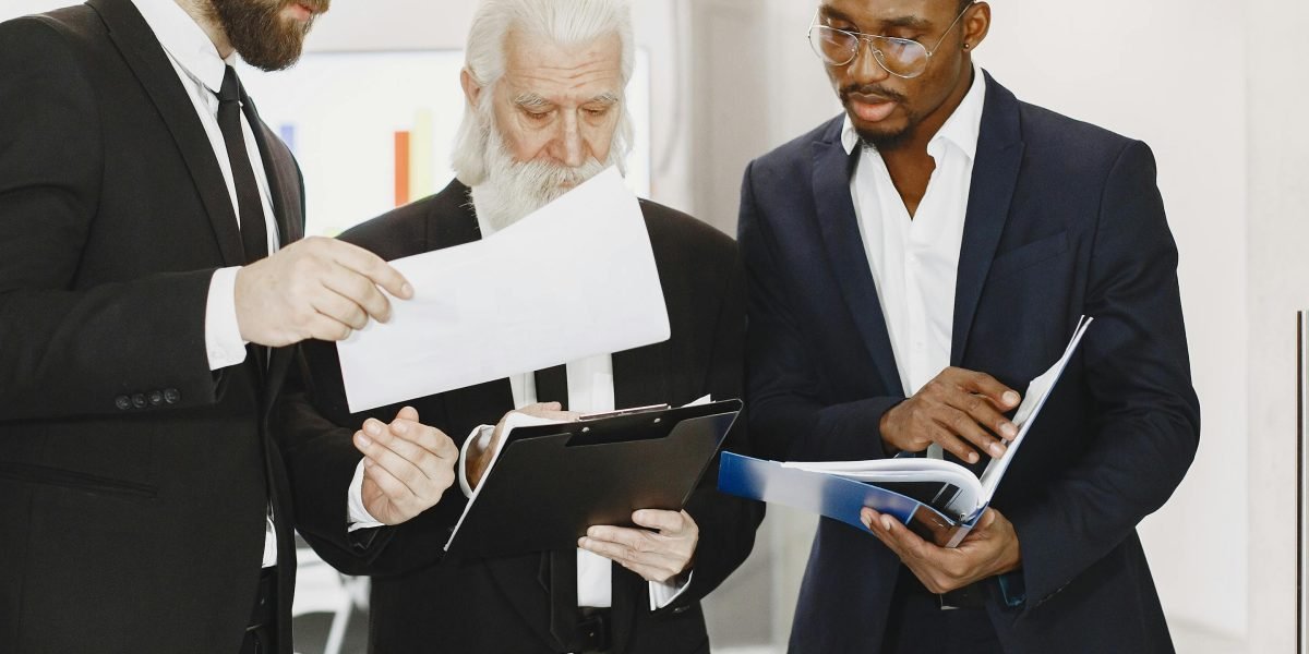 Business leaders making strategic decisions, reflecting trust and safety in AI adoption.
