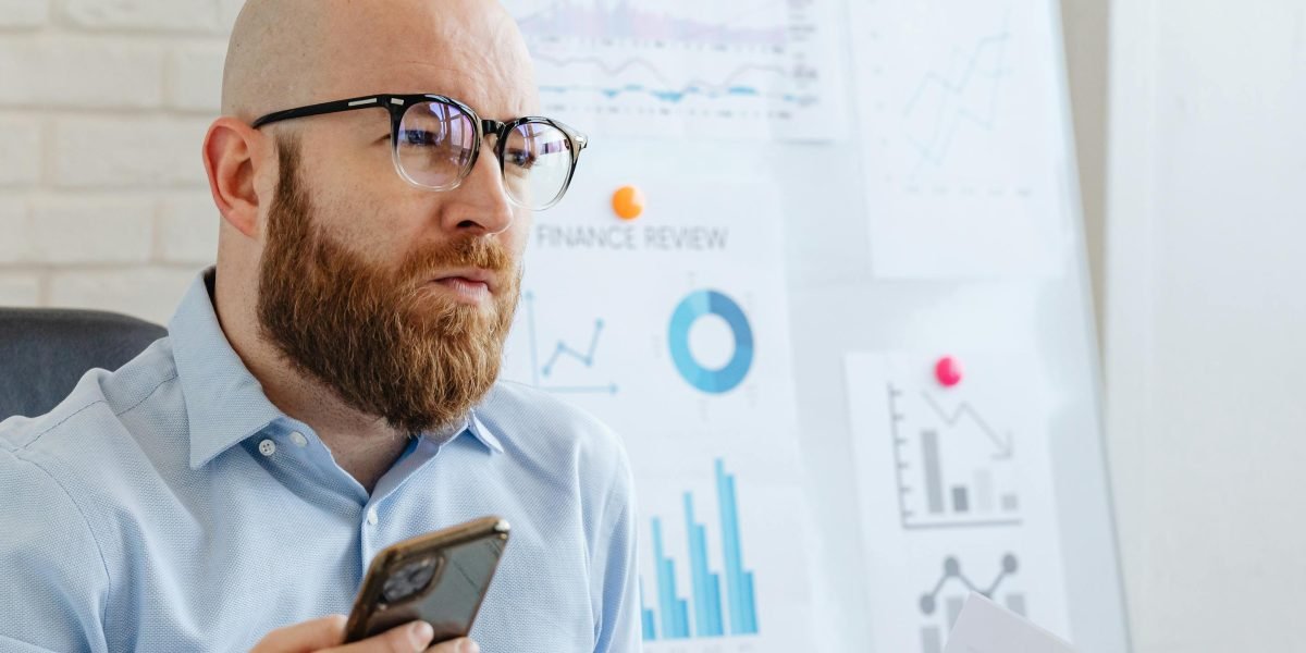 A person confidently analyzing complex data to make informed business decisions.