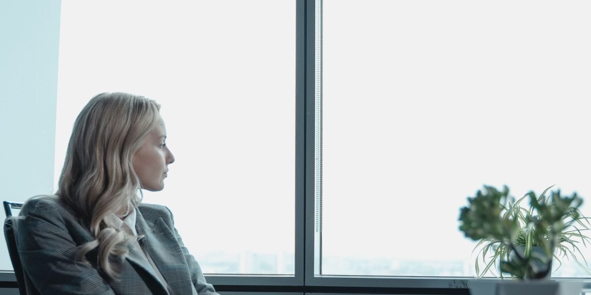A professional thoughtfully planning, symbolizing the need for strategic foresight in a rapidly changing AI landscape.