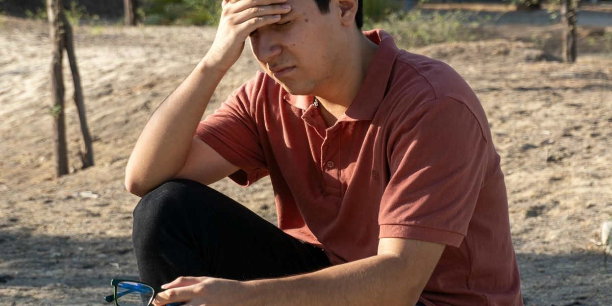 A person feeling overwhelmed by a multitude of new information, symbolizing the initial challenge of learning data science.