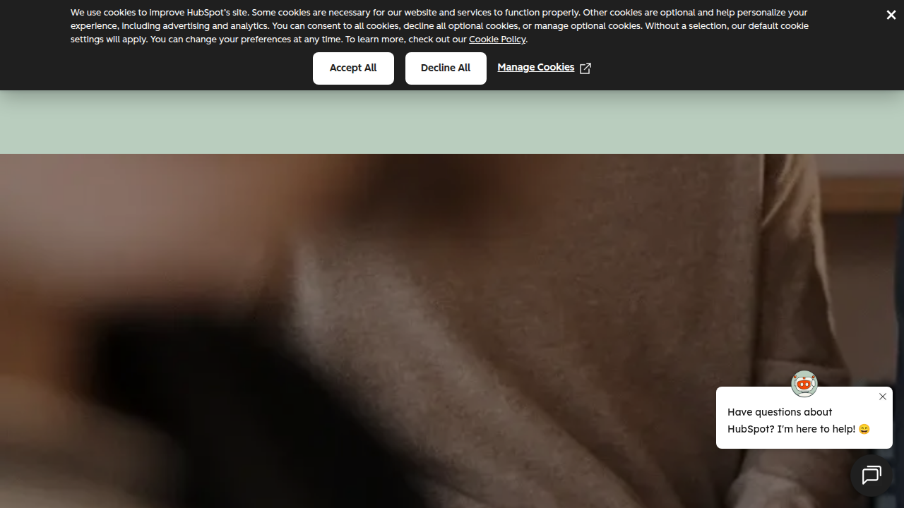 Screenshot of the HubSpot homepage, highlighting its all-in-one CRM and marketing automation solutions.