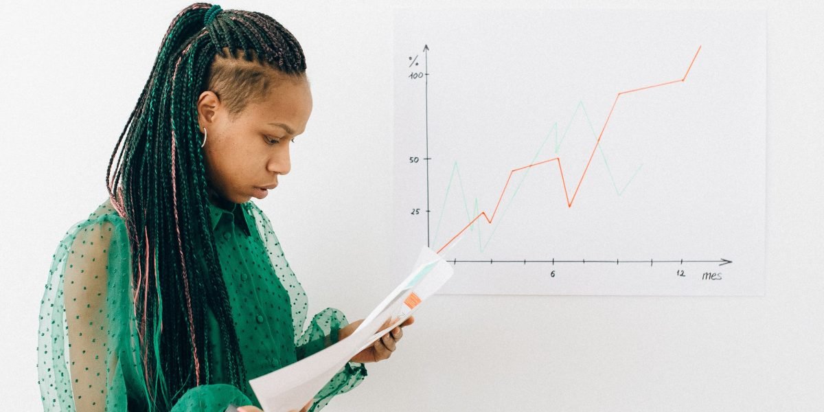 A business leader reviews an analytics dashboard, illustrating the clarity and insights provided by AI optimization tools.