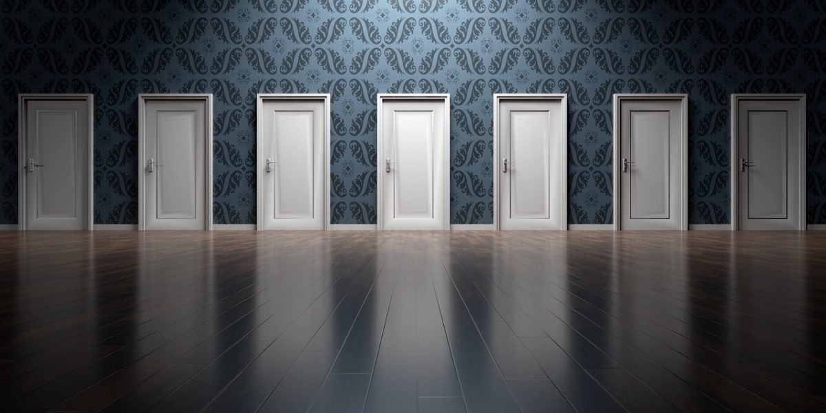 A person thoughtfully evaluates various options, symbolizing the decision-making process for selecting the right AI image generator for specific needs.