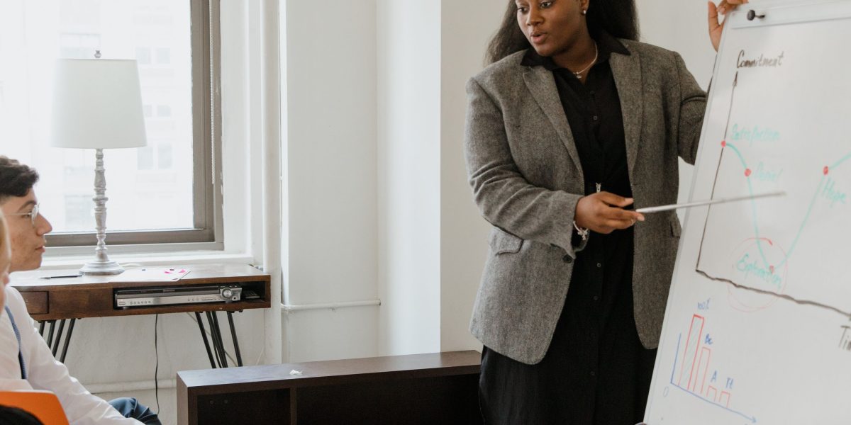 A data analyst presents findings, embodying the shift from number cruncher to insightful storyteller.