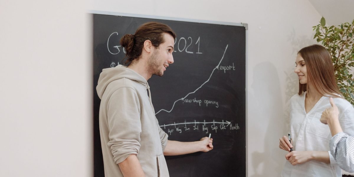 A team collaboratively planning their AI platform evaluation strategy, using a whiteboard.