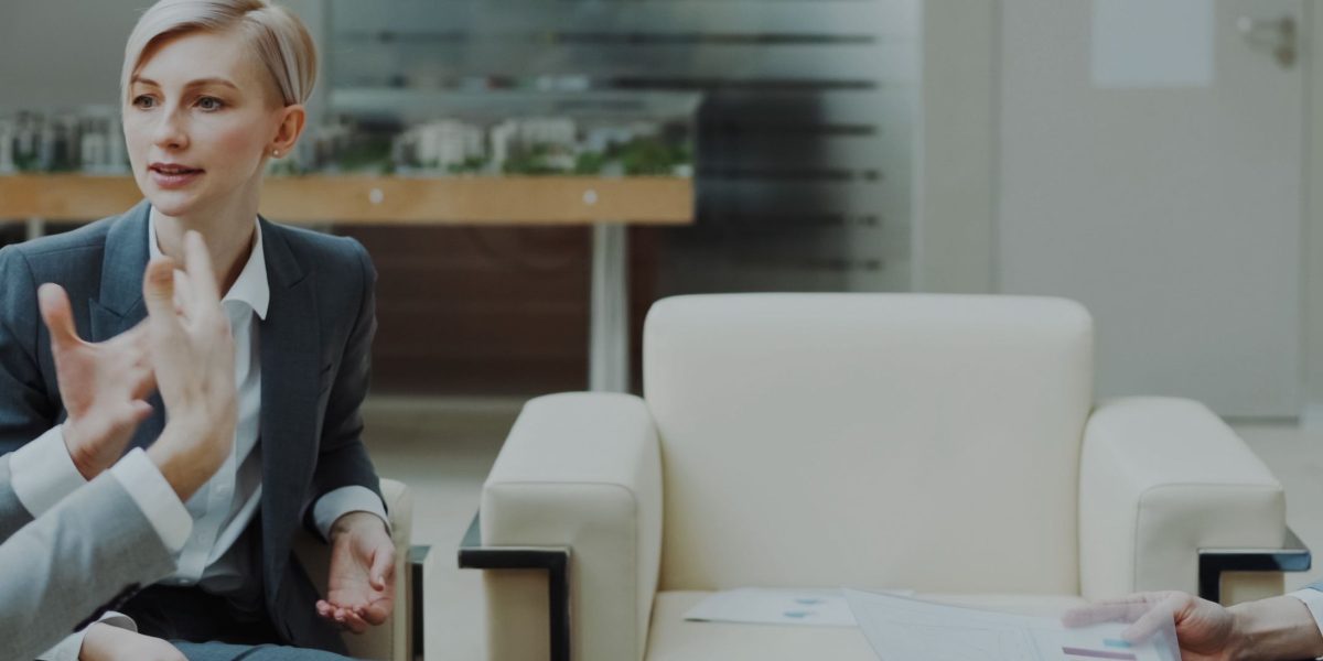 A confident professional engaged in a negotiation, representing discussions about salary and compensation.