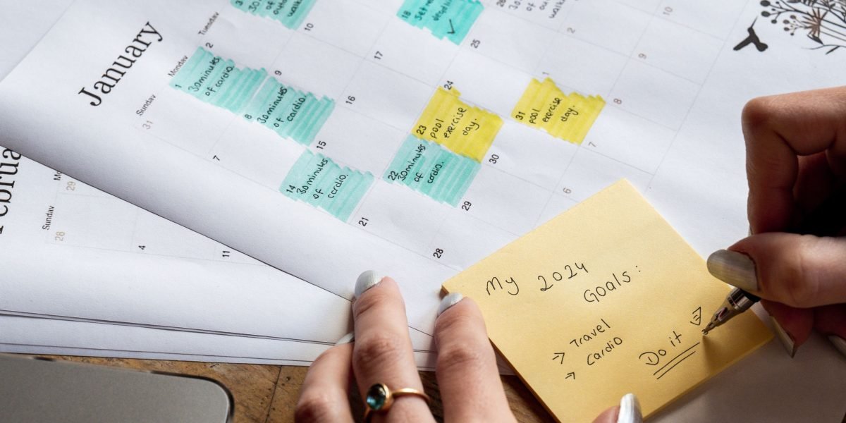 An individual thoughtfully planning their career path as they embark on the journey to becoming a data analyst.