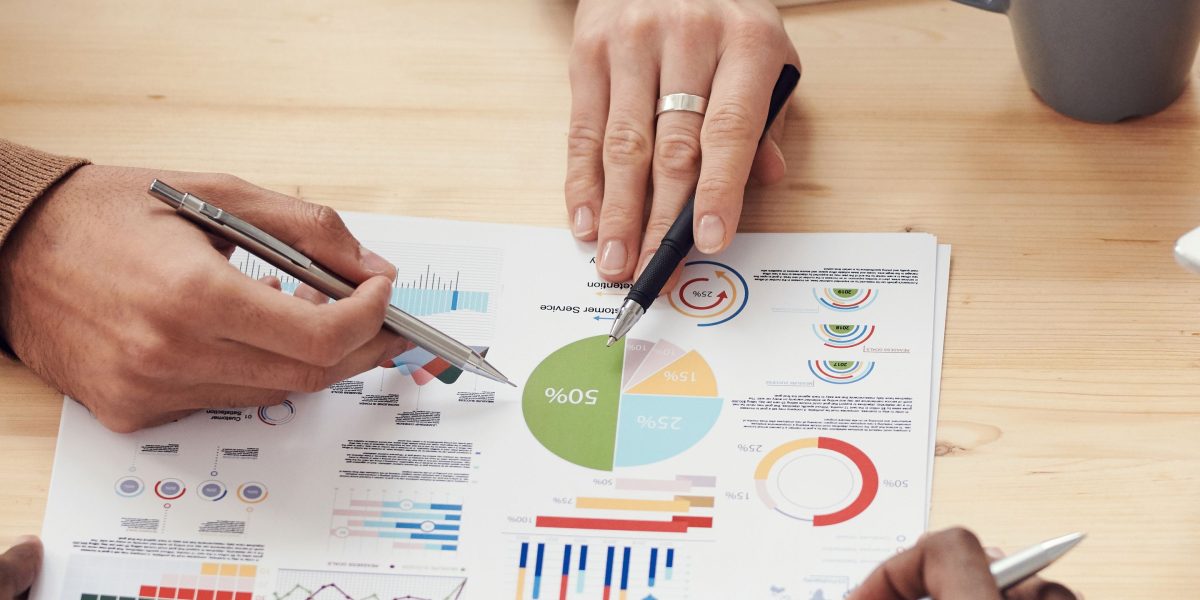 A team collaborates, translating complex data insights into actionable strategies for business growth.
