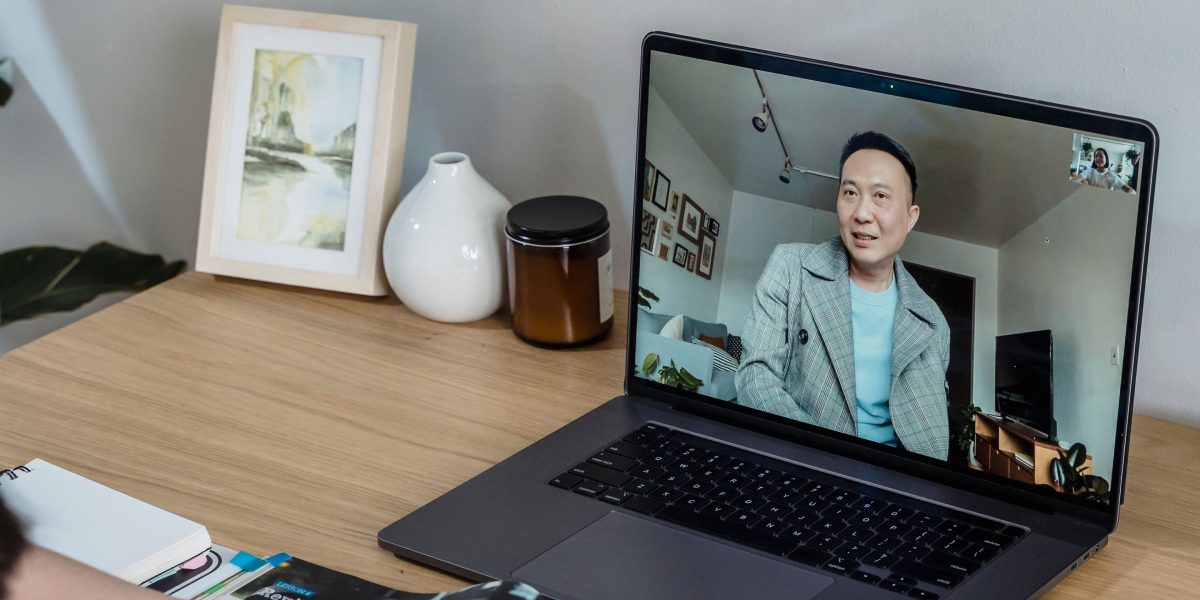 A person focused on their screen, actively engaging in an online learning course to acquire new skills.