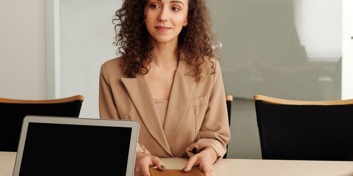 An individual practicing for a job interview, rehearsing answers and presentation skills.