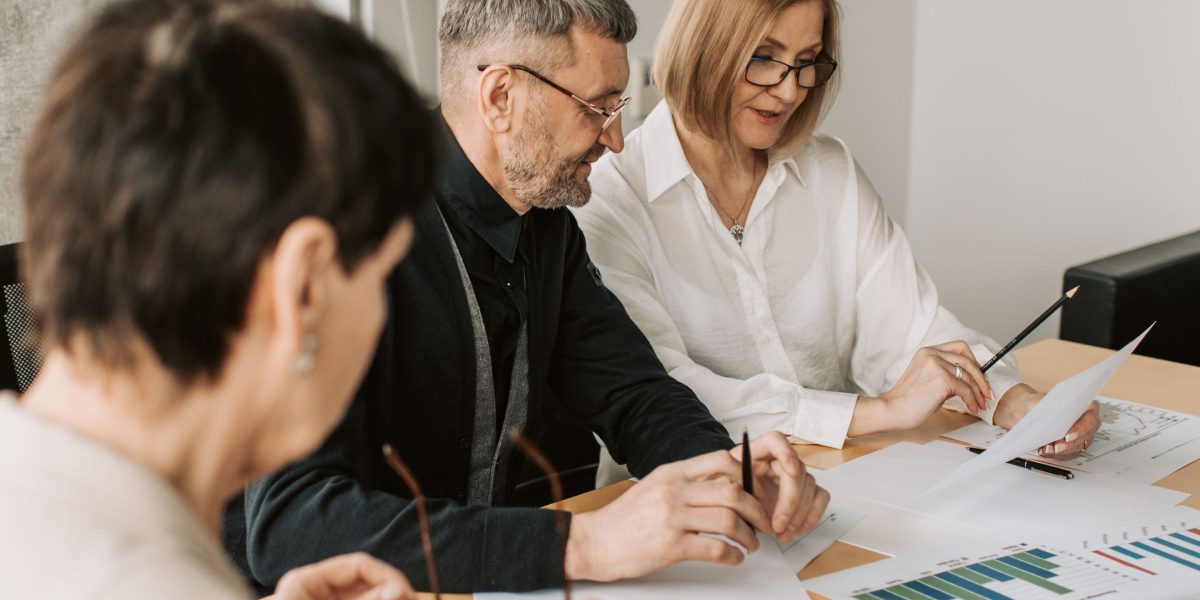 A marketing team actively collaborating, demonstrating how new AI capabilities are integrated into agency services.