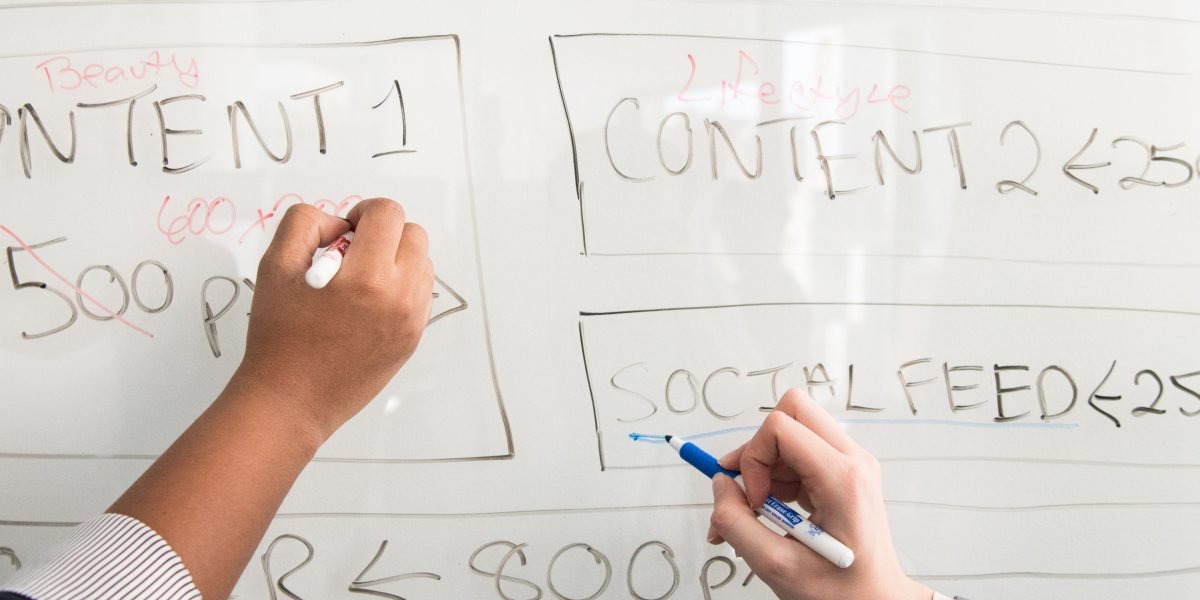 A content creator reflecting on ideas, symbolizing the initial phase of visual content creation.