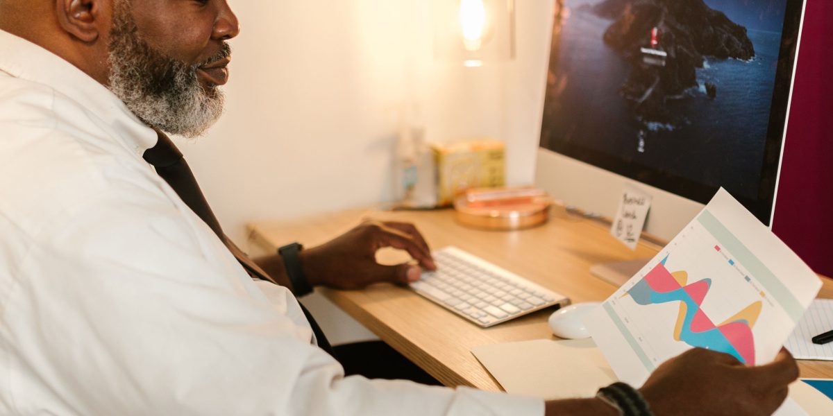 A person intently reviewing detailed data visualizations, emphasizing deep analysis and understanding.