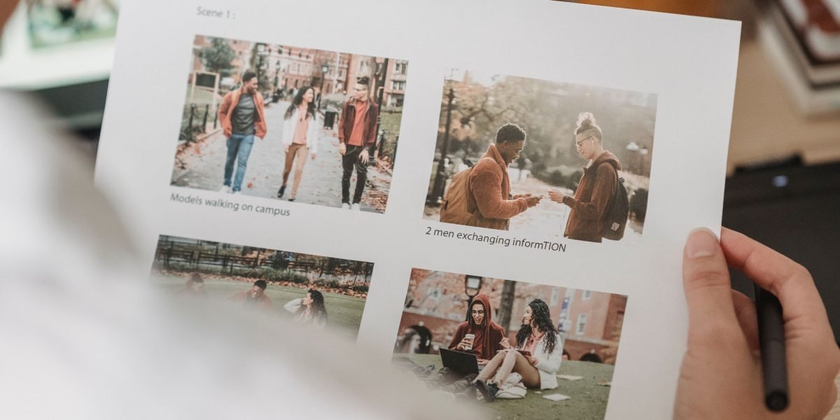 A creative professional carefully reviewing AI-generated visual content for quality and impact.