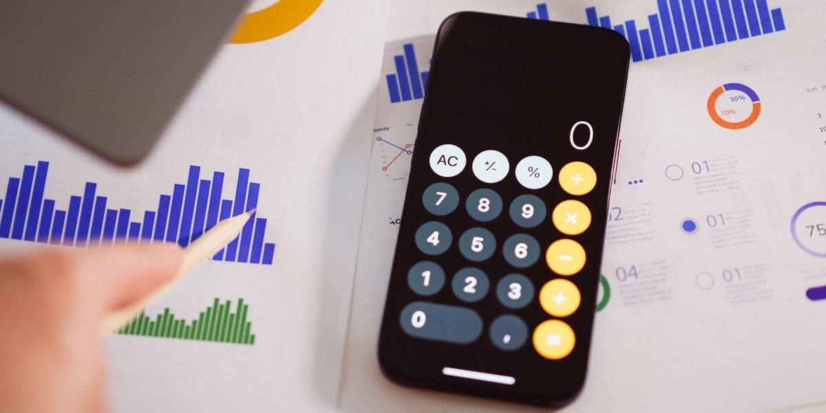 A team reviews financial data and performance metrics to ensure AI projects remain within budget.
