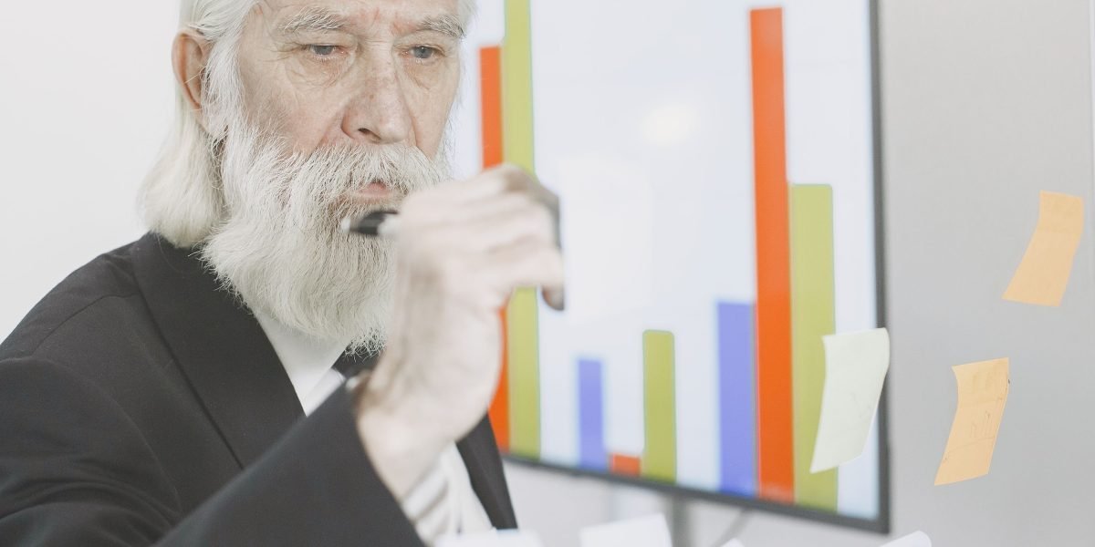 A confident business leader making a strategic decision in a modern office environment, symbolizing practical AI application.