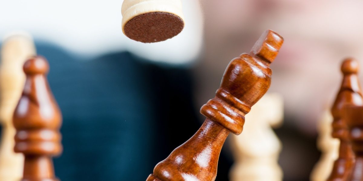 An individual thoughtfully considers different options, symbolizing the trade-offs in decision-making.