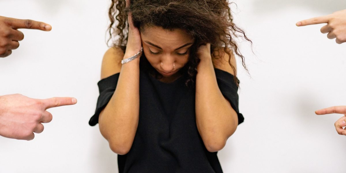 A person feeling overwhelmed by numerous choices, reflecting the challenge of decision overload.