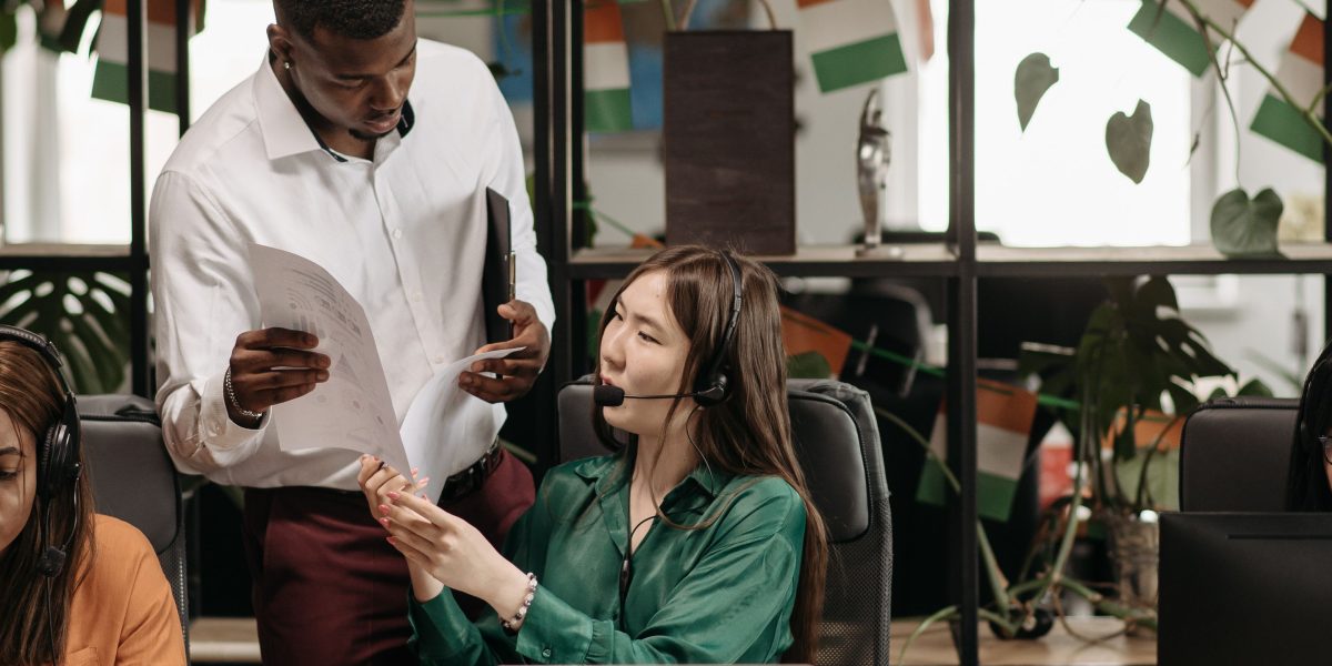 A business team engaged in discussion, focusing on understanding and meeting customer needs to develop successful products.