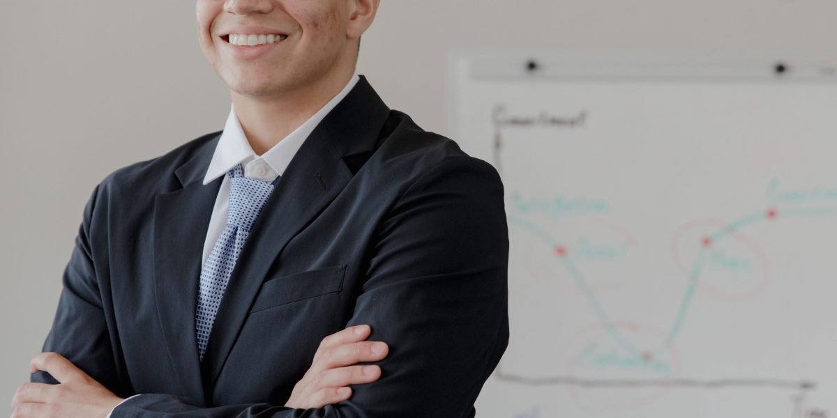 A person celebrating a career milestone, reflecting the positive return on investment from data analytics certifications and skills.
