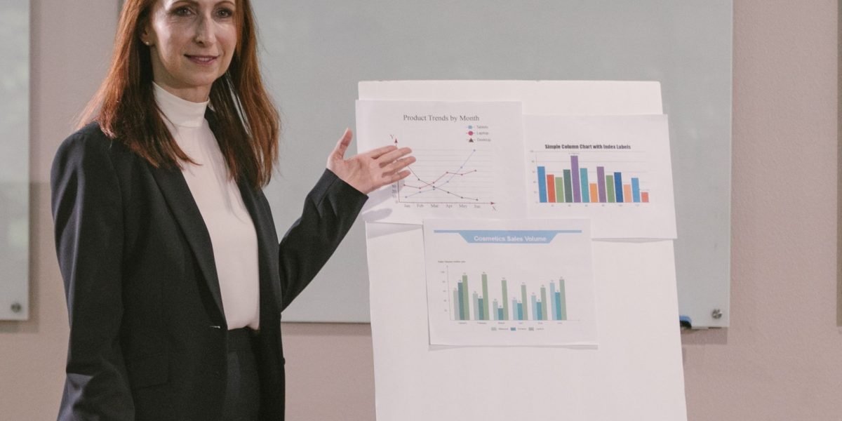 A business leader presenting a chart showing successful growth, demonstrating the measurable ROI and operational impact of smart data.